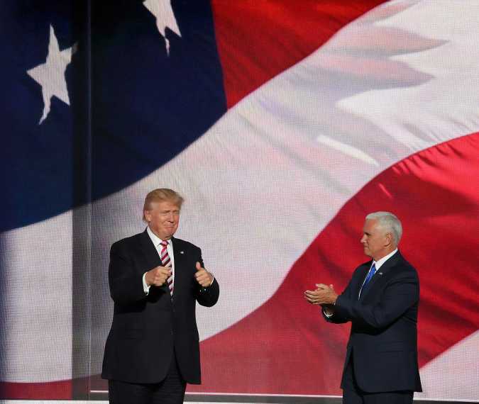 Trump reiterates pledge to send $5,000 checks, and hands out smaller payments, as midterm elections loom